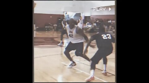 Kyrie Irving crosses over Kobe Bryant
