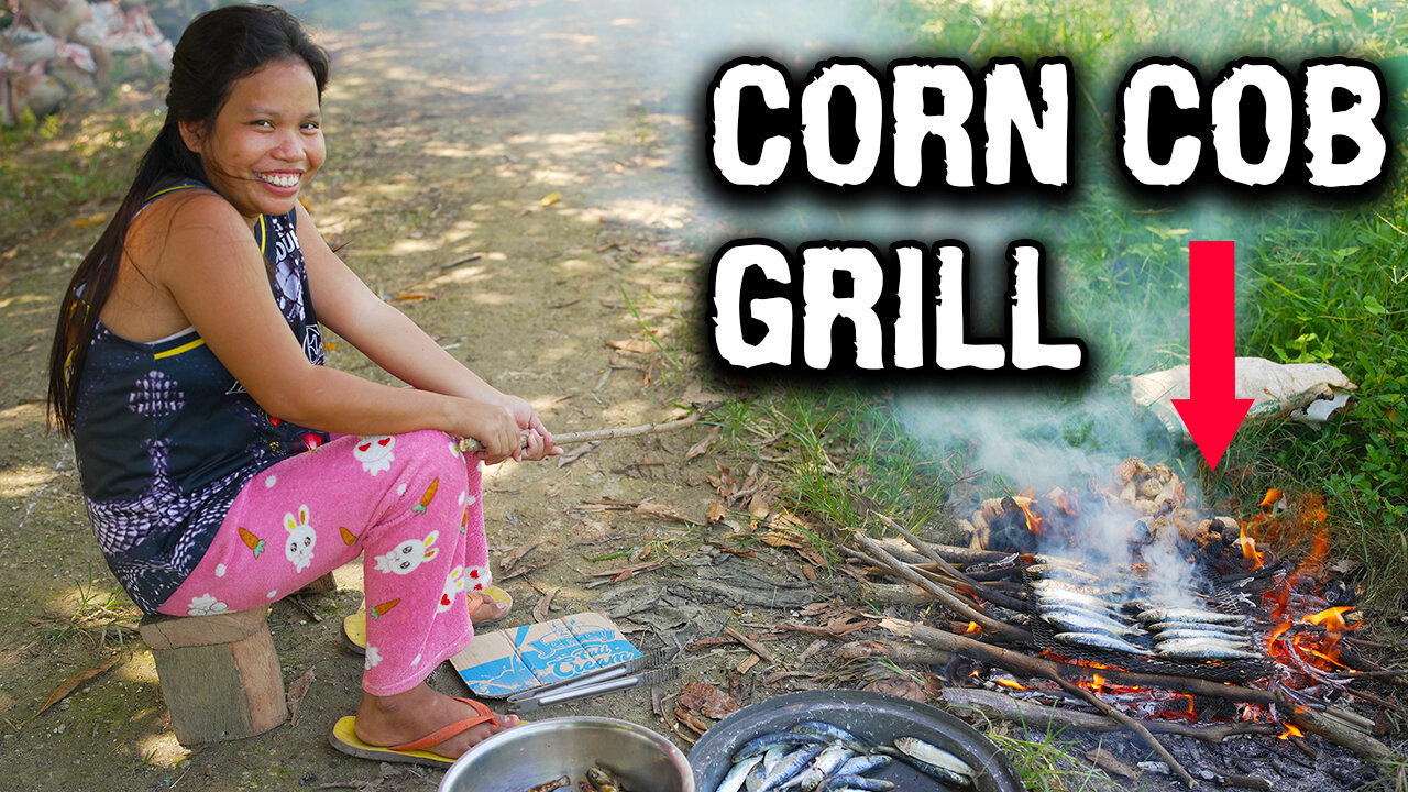 Cooking Fish On Corn Cob Pellet Grill in Philippines Village