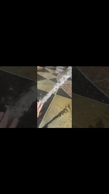 Playing in the Fountain in Slow Motion