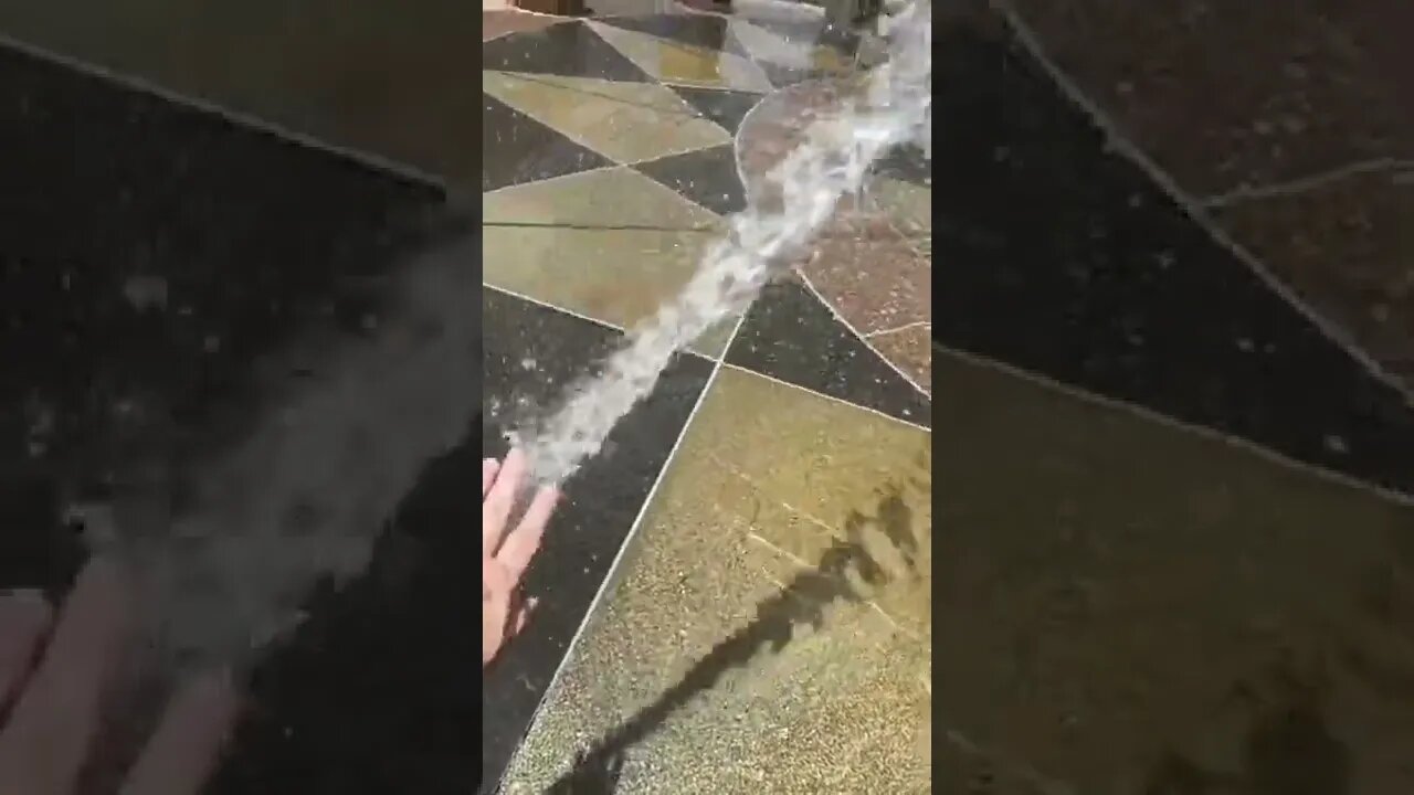 Playing in the Fountain in Slow Motion