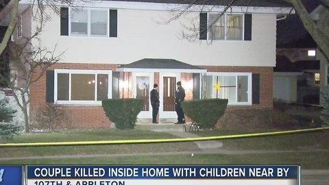 Couple killed inside home with children nearby