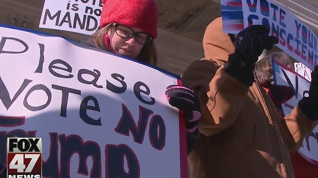 Hundreds protest Electoral College vote