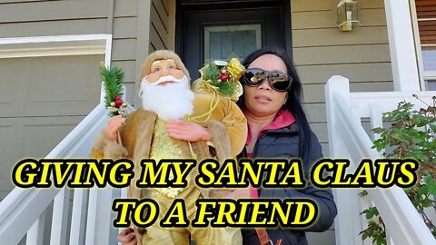 GIVING MY SANTA CLAUS TO A FRIEND