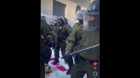 CANADIAN FLAG TRAMPLED BY FOREIGN TROOPS IN OTTAWA