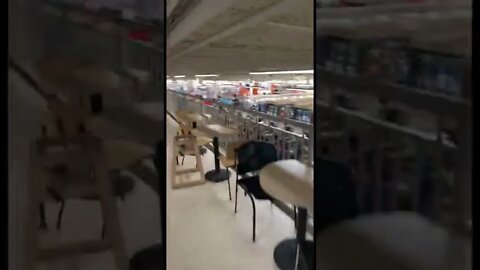 A large piano inside a grocery store