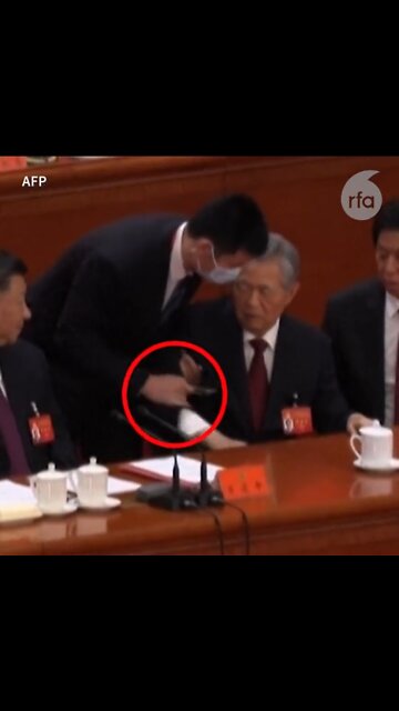 Hu Jintao: ex-president escorted out of China party congress