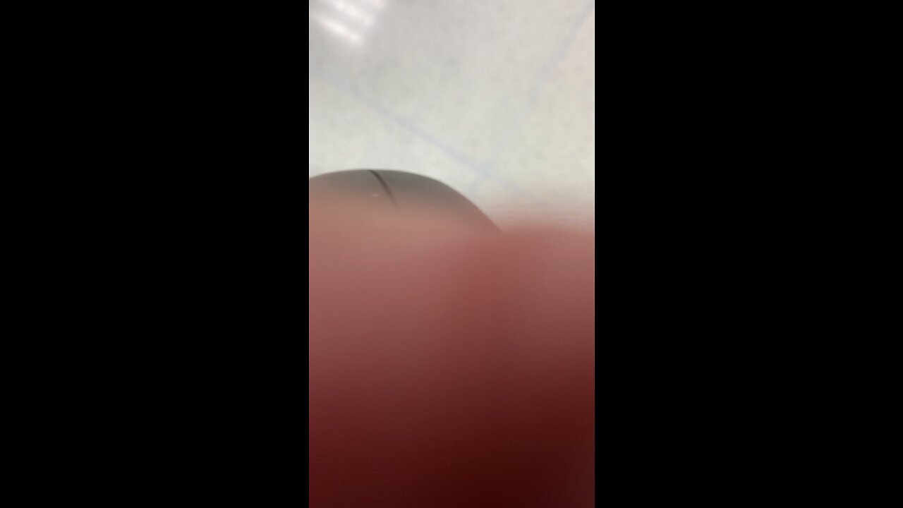 TESS RIDES THE ESCALATOR AT ATLANTA AIRPORT