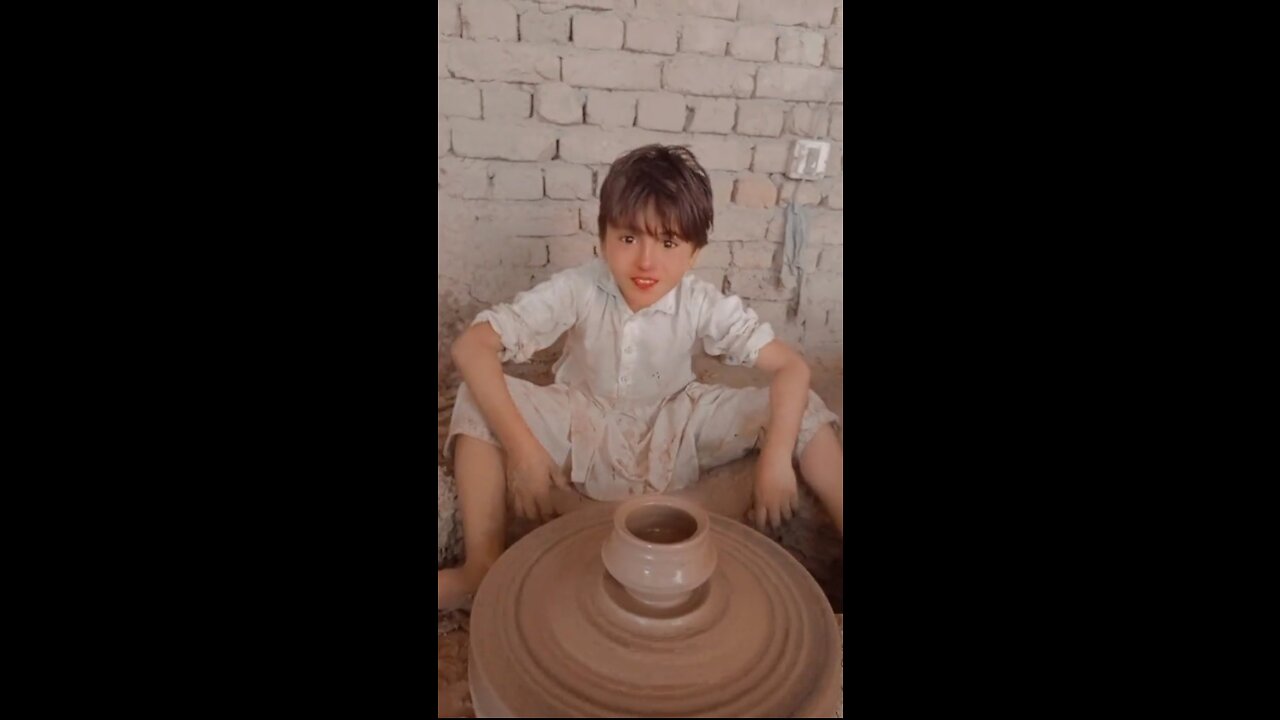 Cute baby Making clay pots