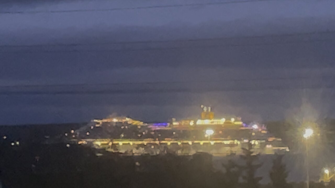 A Huge Cruise Ship Leaving Cape Breton Island At Night