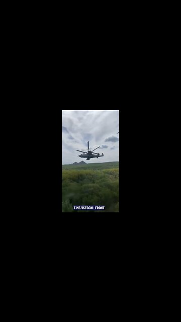 Beautiful shot of a low-flying Ka-52 filmed from the air