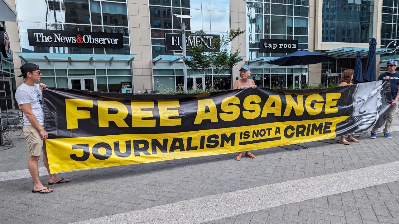 Julian Assange supporters bring banner to Raleigh, NC for incarcerated publisher's 52nd birthday