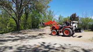 Making our Parking Bigger, Spreading some Gravel.