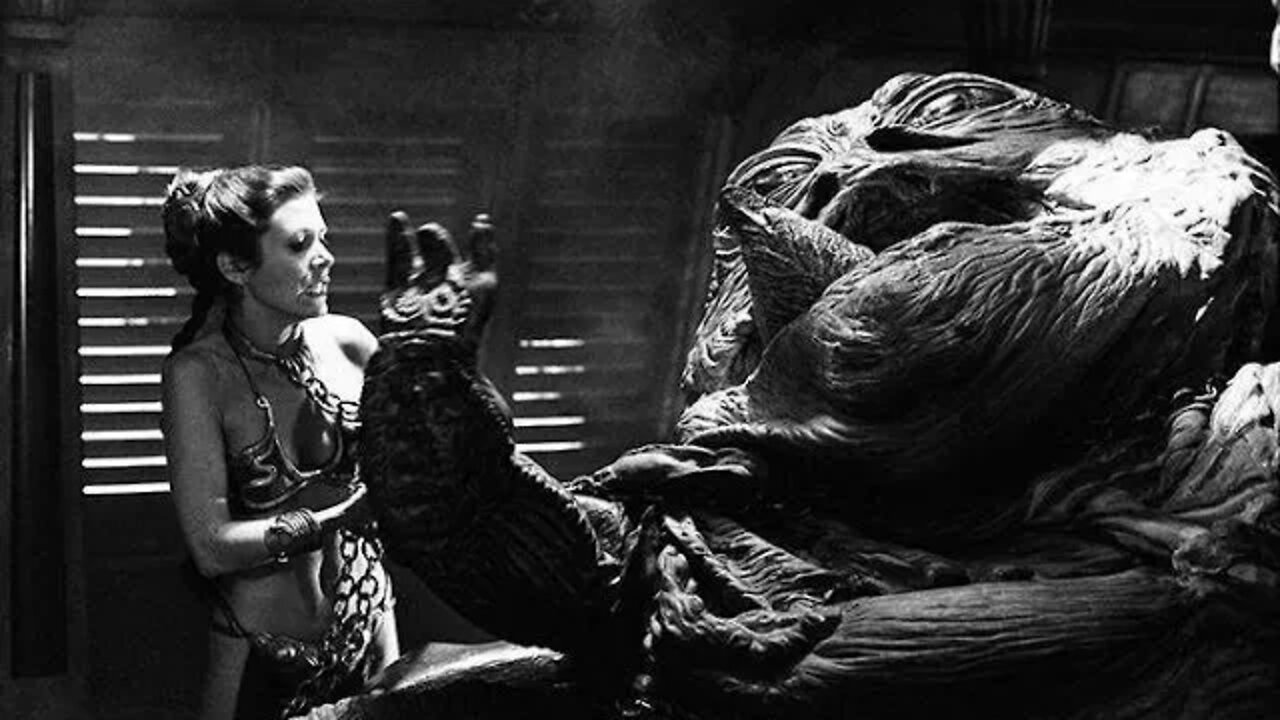 Carrie Fisher as Princess Leia strangles Jabba the Hutt on the set of Return of the Jedi