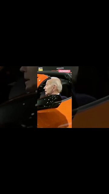 Biden revs up Corvette at Detroit Auto Show 2022.