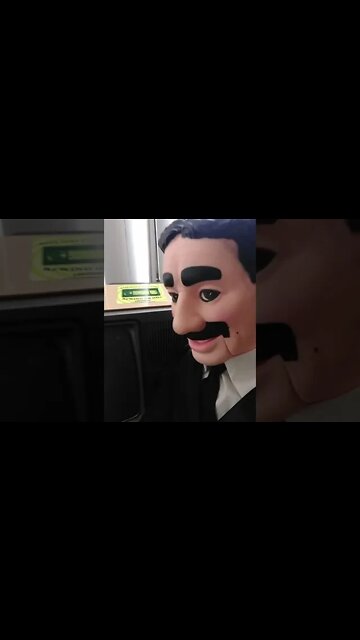 Groucho showing off the brand new television set📺