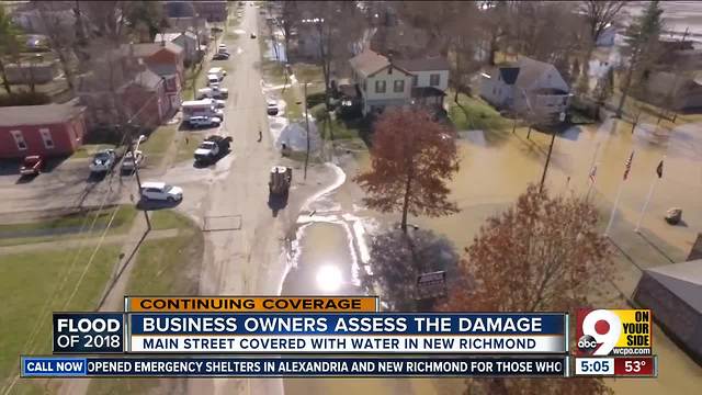 New Richmond business owners check out flooding damage from Ohio River