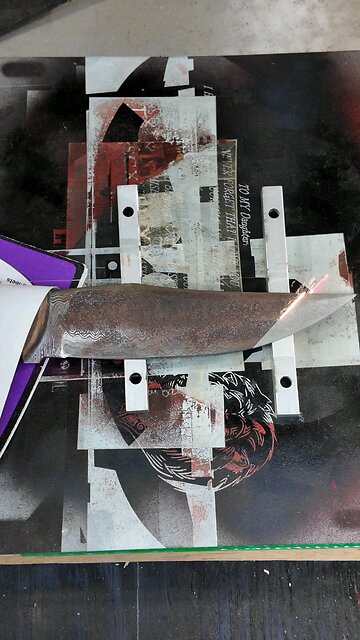 Removing rust from a knife with a laser