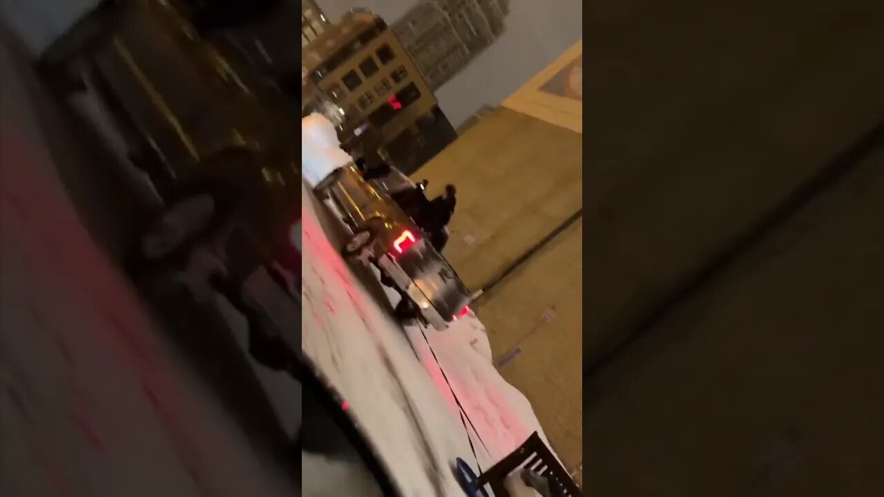 Man is pulled through downtown Minneapolis on a "bed-sled." part 2