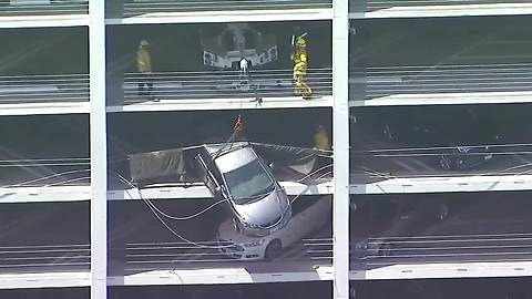Car dangles from Santa Monica parking garage