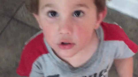A Cute Boy Thrilled To Have A Younger Brother