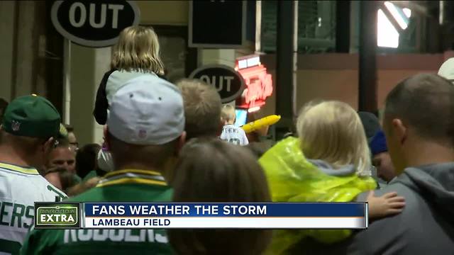 Storms force Packers' fans to briefly evacuate Lambeau Field bowl during Family Night