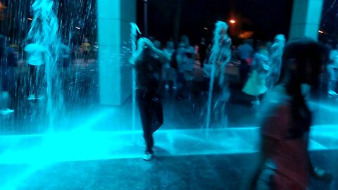 People dig and have fun in the fountain