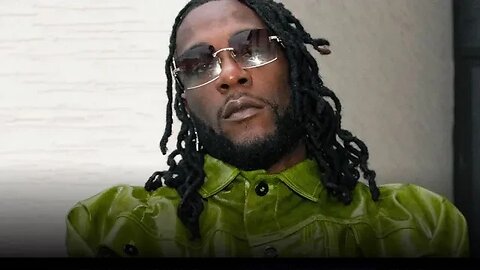 The moment Burnaboy got a girl gobsmacked as he surprises her with a hug and cash on her birthday