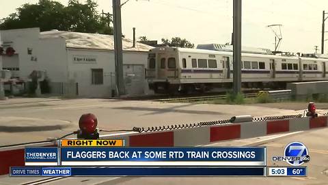 Flaggers return to some RTD crossings after company finds glitch at gates