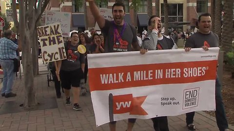 Men in high heels fight domestic violence