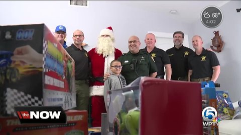 St. Lucie County Sheriff's Office deputies bring toys to son of murdered woman