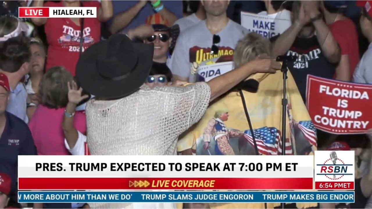 Roseanne Speaks At Trump's FL Rally, Brings Her DJT Signed Magador Jacket