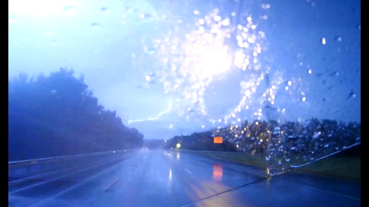 Spectacular lightning caught on dashcam while driving during storm