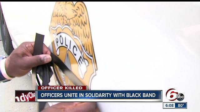 Officers unite in solidarity with black band