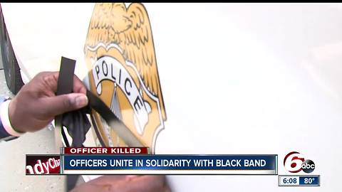 Officers unite in solidarity with black band