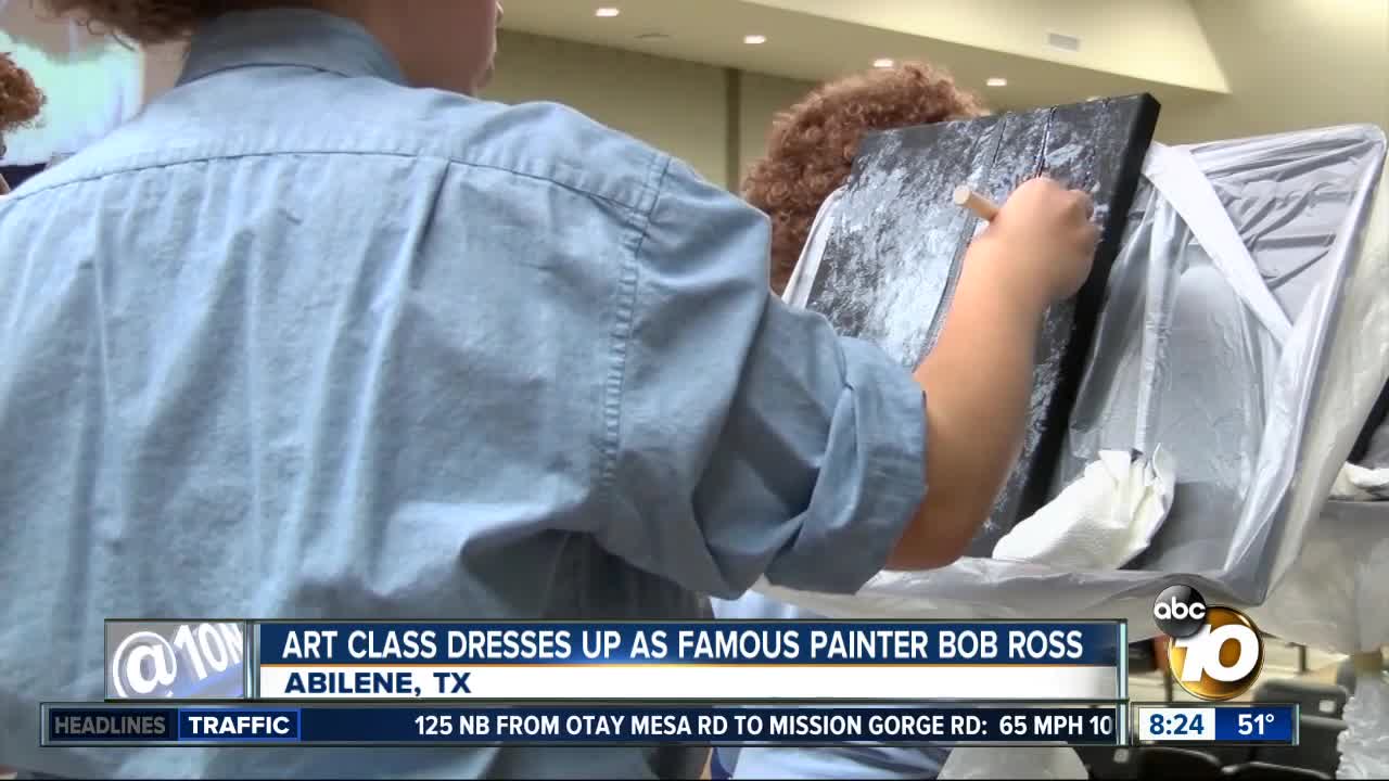 Art class dresses up as famous painter Bob Ross