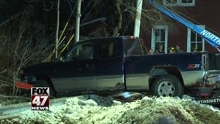 Man hospitalized after nearly driving into Grand River in Lansing