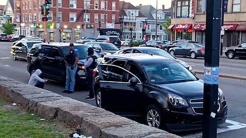 Boston police conducting a motor vehicle stop at the intersection of Columbia Road and Blue Hill Ave