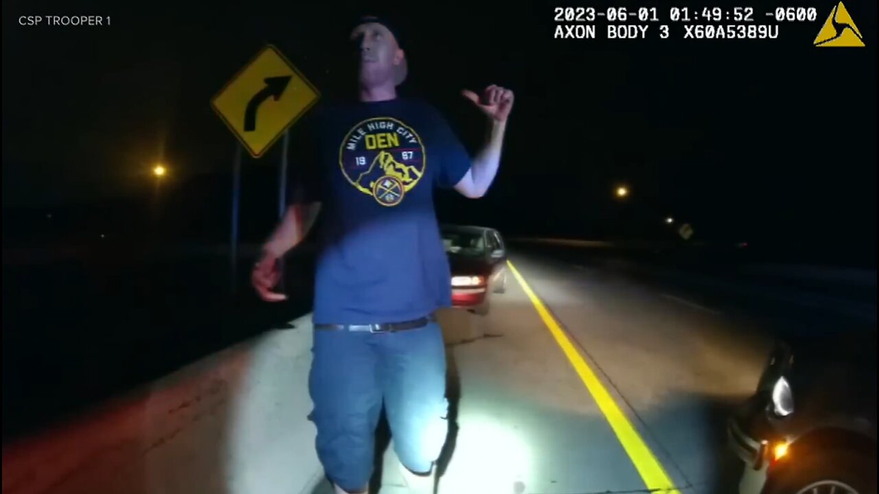 man takes off in vehicle after being tased and tries to run across a busy interstate at night.