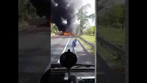 Angel dressed in white who appears in the video and saves the truck driver from an explosion