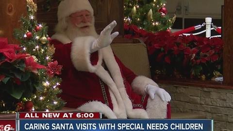 Caring Santa visits with special needs children