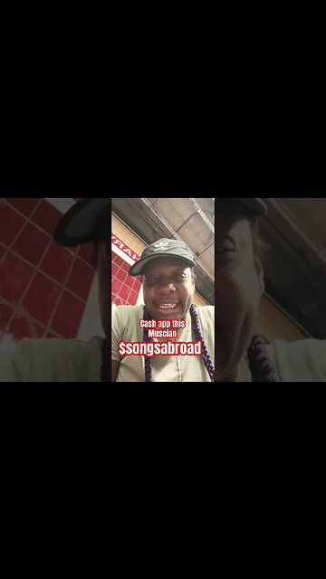 Street Performer playing national anthem at Harvard Station. His mission is to support World Frredom