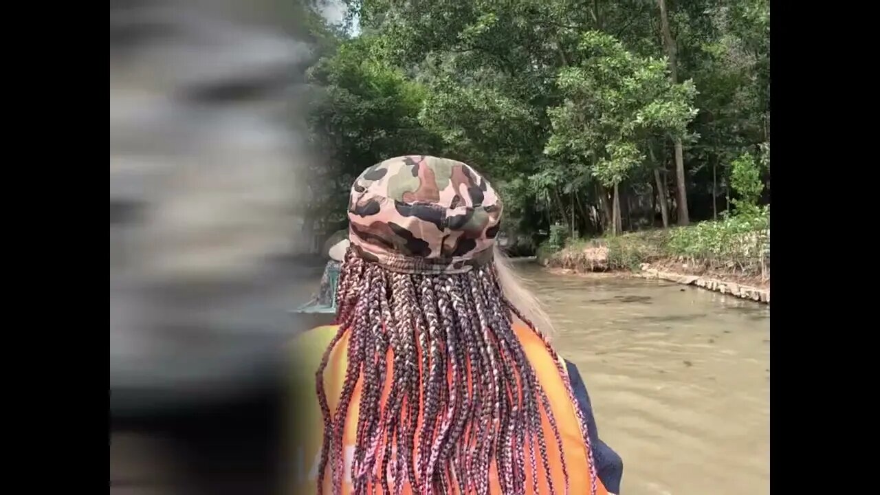 Bamboo boat driver named Nam takes us for a tour in Tam Coc Vietnam.