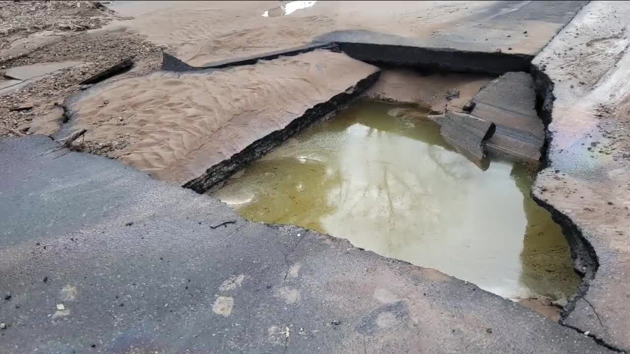 Neighbors on east Denver street speak out about numerous sinkholes