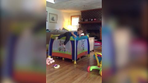 "A Tot Boy Tries to Escape His Crib While the Grandma Is Watching"