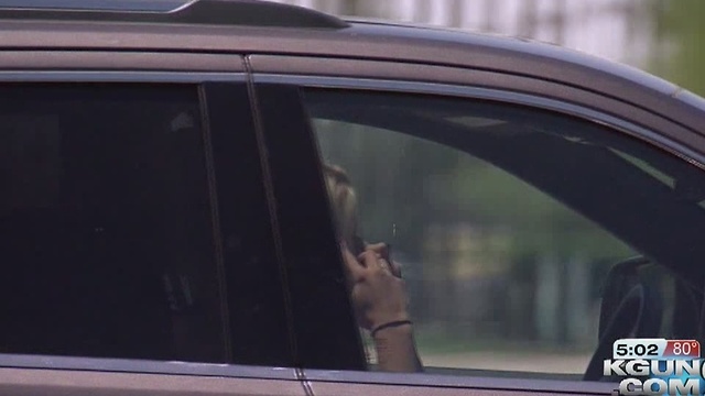 Tucson may make talkative drivers use hands-free phones