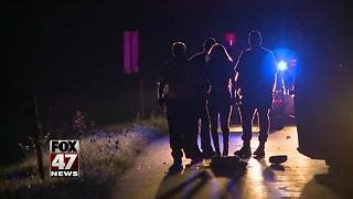 Rollover closes busy Mid-Michigan highway