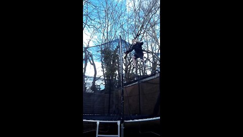 Kid Jumps Off Roof Onto Trampoline