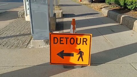 work is repairing the cracks in the bike lane along the Southwest corridor