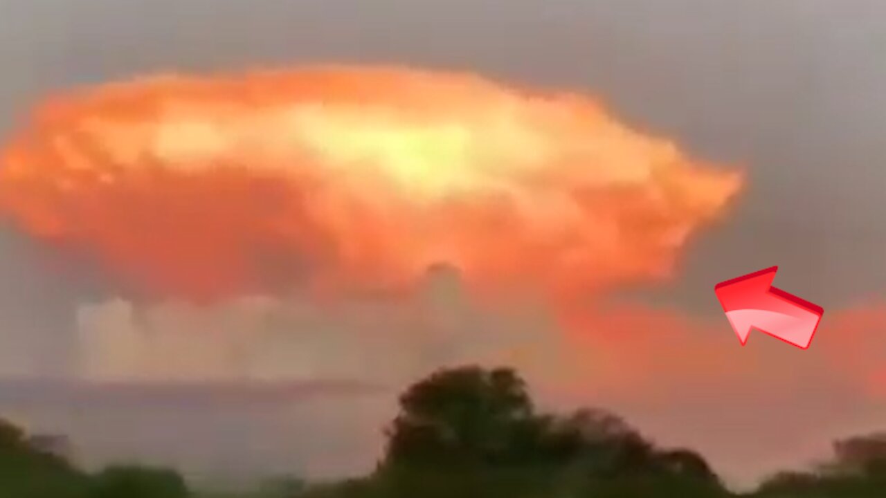 Witnessing an orange cloud on top of the gray cloud taken while driving [Mysterious]