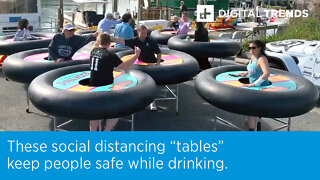 These social distancing “tables” keep people safe while drinking.